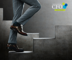 Person climbing stairs, Strategic CFO logo present.
