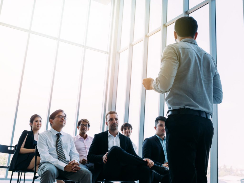 Business presentation in modern office setting.