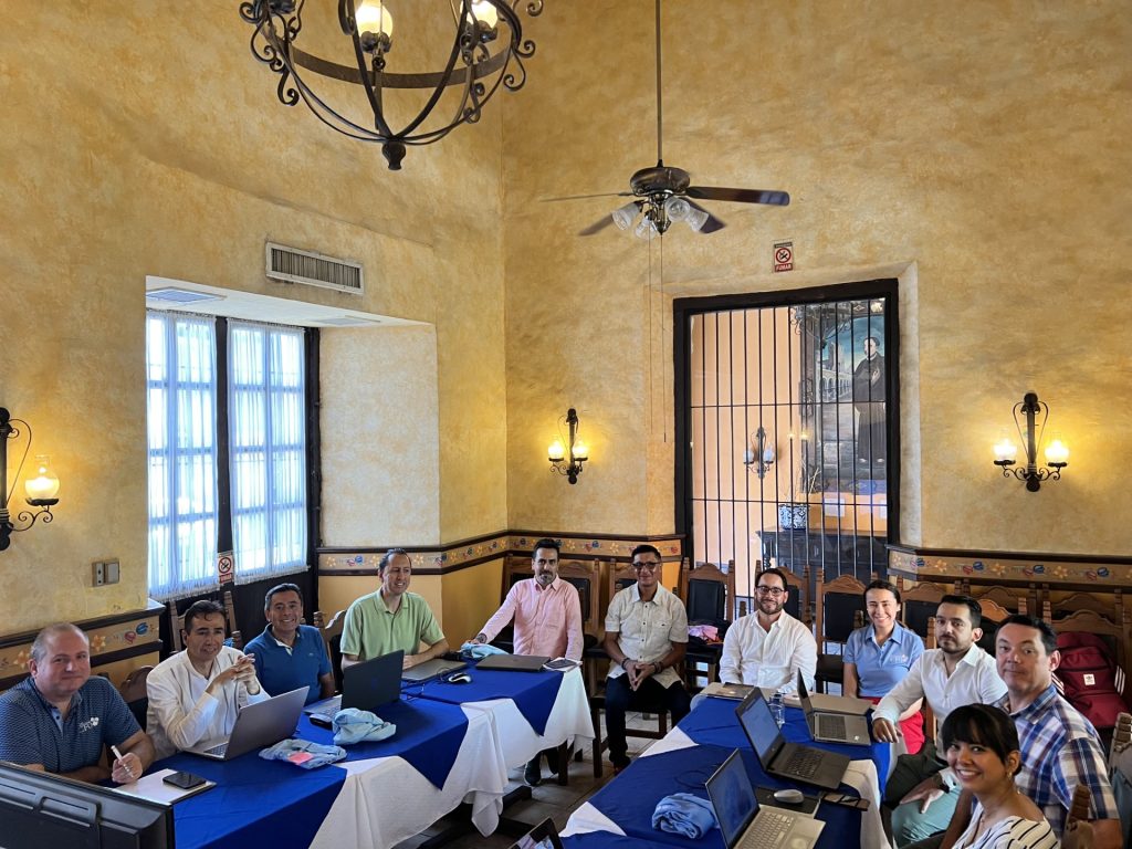 Group Meeting in Warmly Lit Conference Room